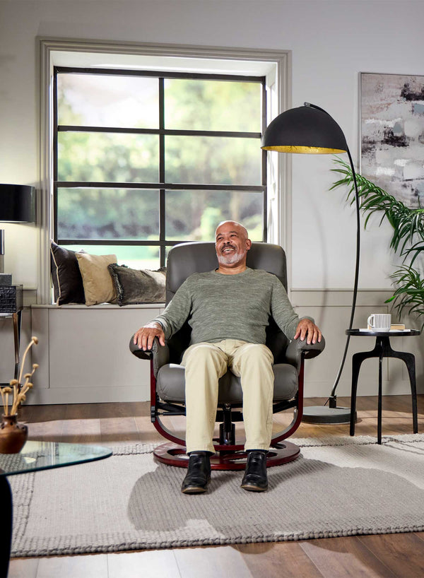 Toronto Heat and Massage Swivel Recliner in use