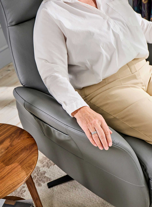 Belmont Swivel Riser Recliner in use