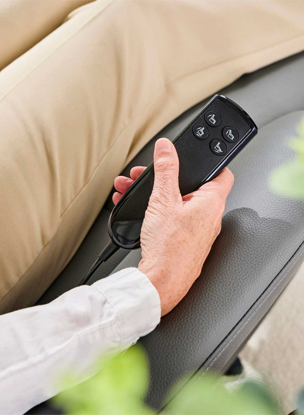 Belmont Swivel Riser Recliner in use