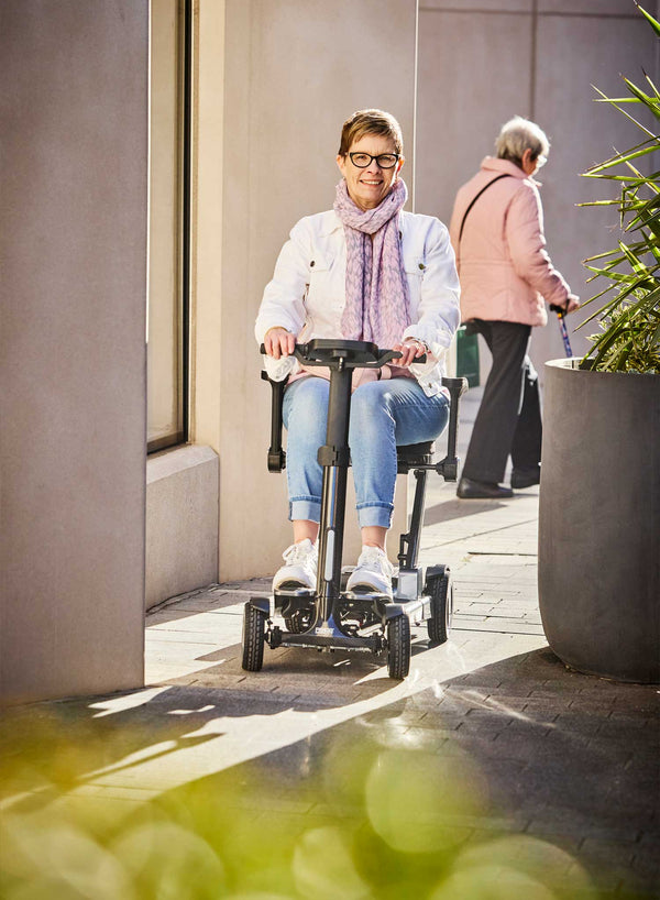 Pride GoGo Carbon Folding Scooter in use