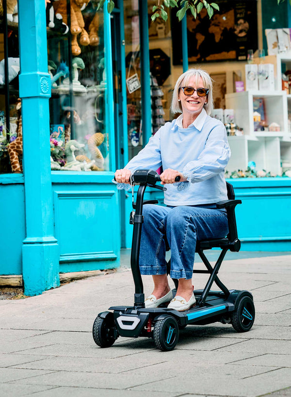 Li-Tech Cybex Electric Folding Scooter in use