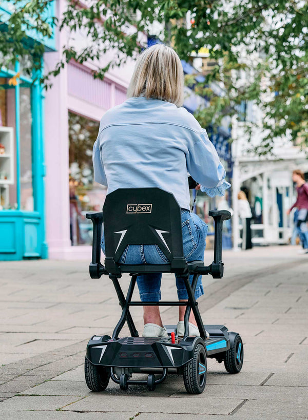 Li-Tech Cybex Electric Folding Scooter in use
