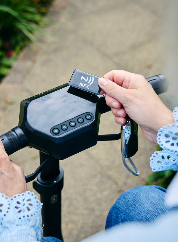 Li-Tech Cybex Electric Folding Scooter in use