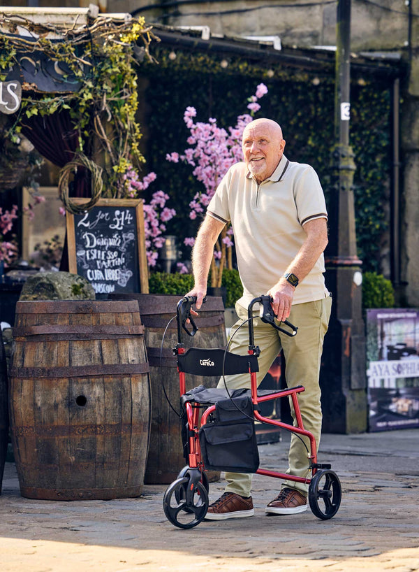 CareCo Triance Tri-Walker with Seat in use
