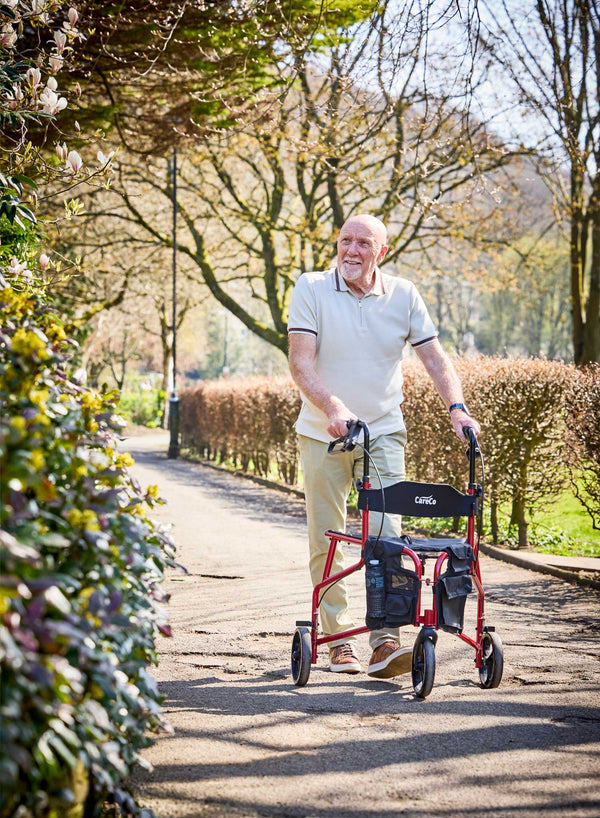 CareCo Triance Tri-Walker with Seat in use