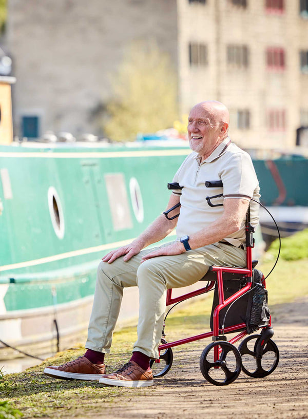CareCo Triance Tri-Walker with Seat in use