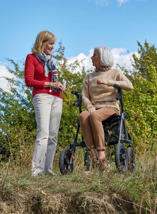 Traxion Outdoor Rollator in use