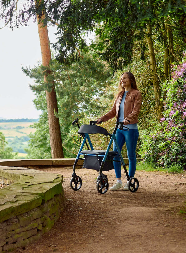 CareCo Oracle Rollator in use