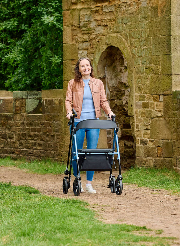 CareCo Oracle Rollator in use