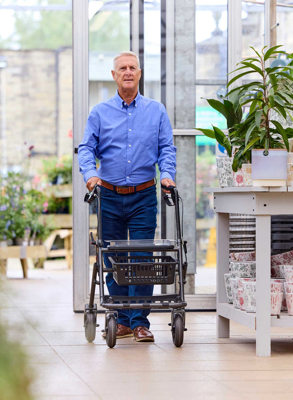 CareCo Metro Rollator in use