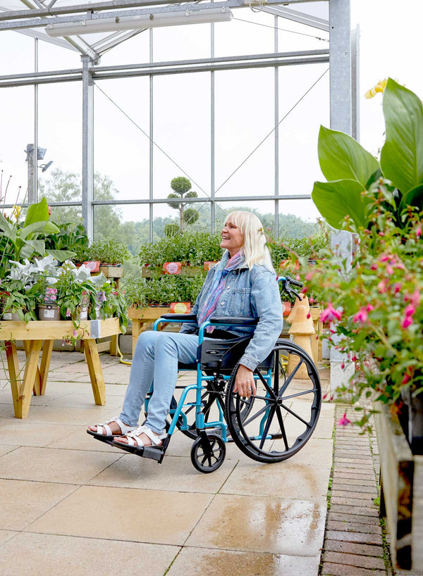 CareCo Graviti Self-Propelled Wheelchair in use