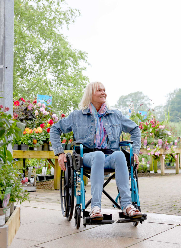 CareCo Graviti Self-Propelled Wheelchair in use