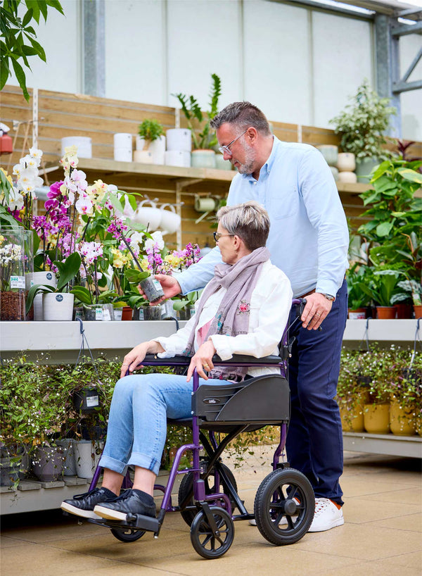 CareCo Infiniti Transit Wheelchair in use