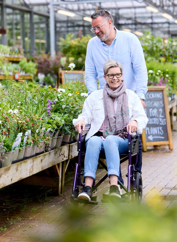 CareCo Infiniti Transit Wheelchair in use