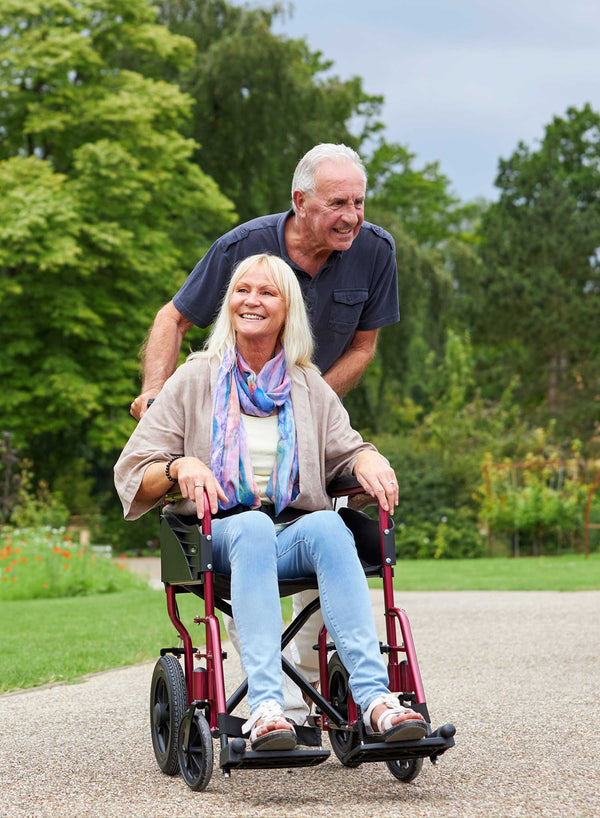 CareCo Infiniti Transit Wheelchair in use