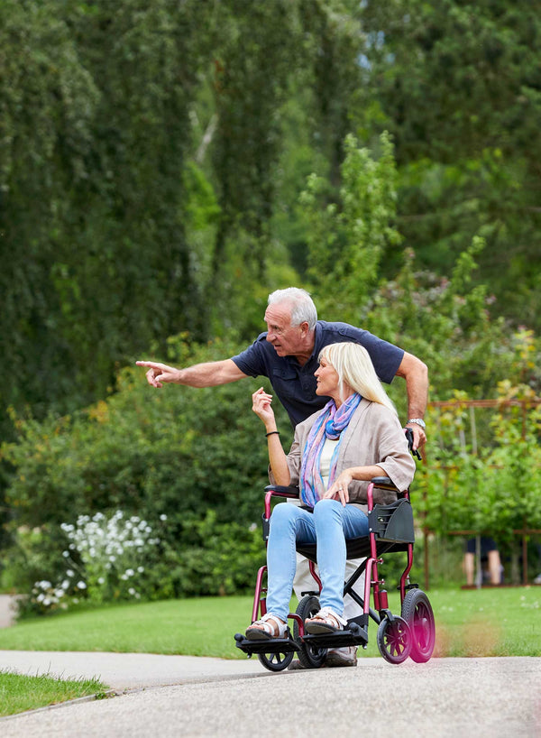 CareCo Infiniti Transit Wheelchair in use