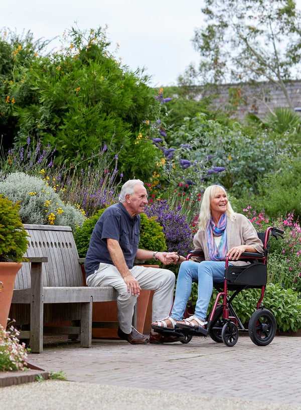 CareCo Infiniti Transit Wheelchair in use