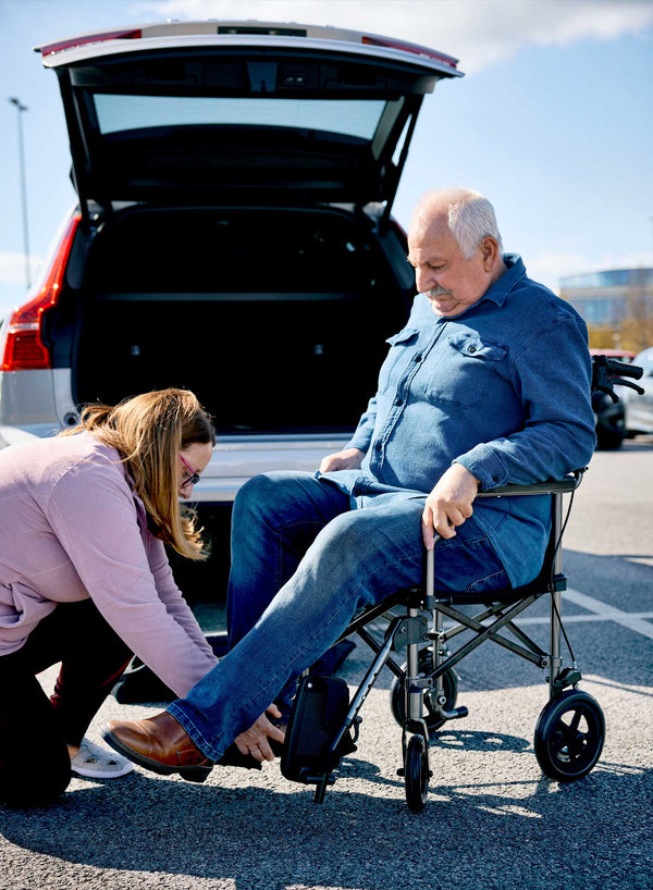 CareCo Travel Air Compact Wheelchair in use