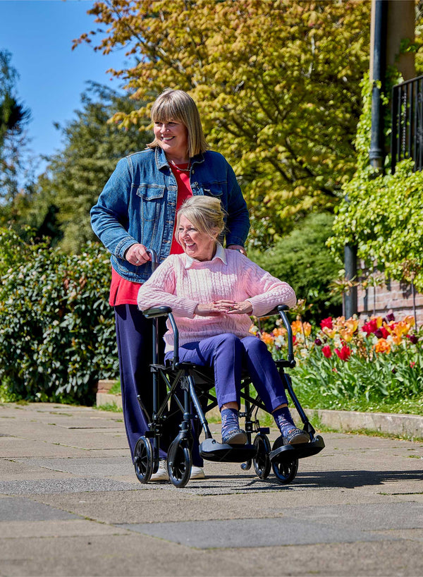 CareCo Fold and Go Wheelchair with Carry Bag in use