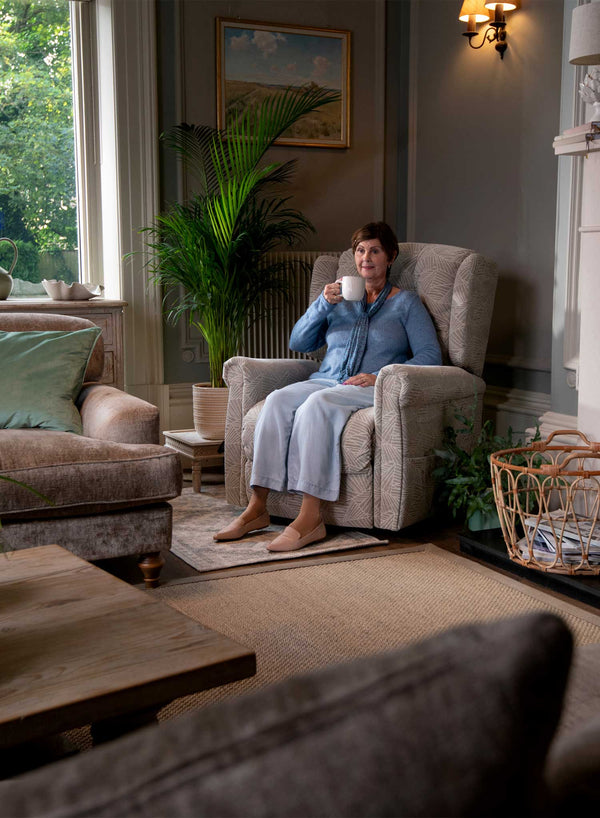 Henley Wingback Riser Recliner in use