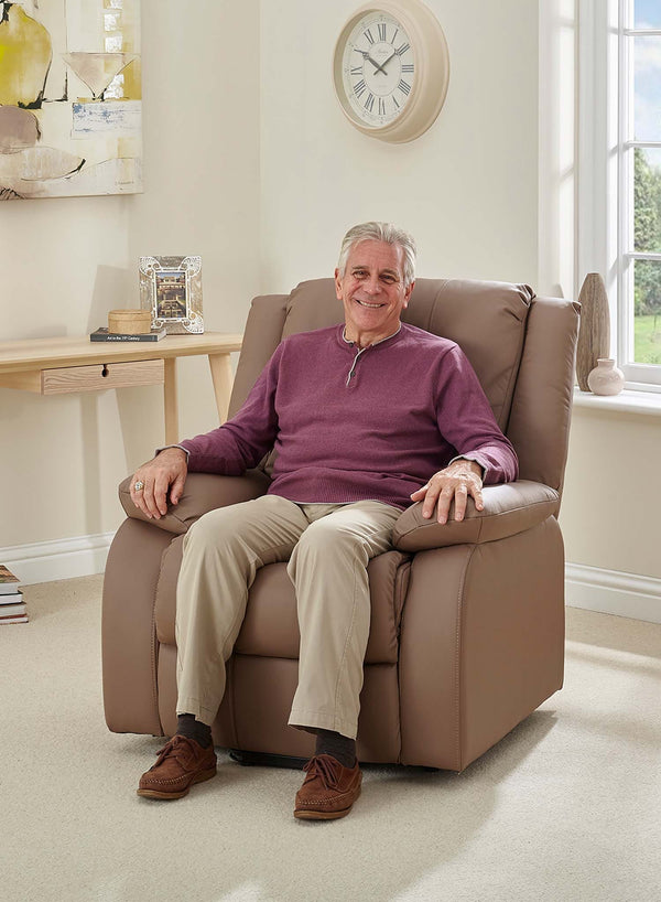 MaxiComfort Oasis Leather Riser Recliner in use