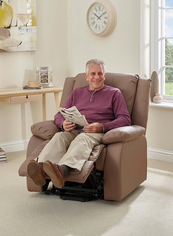 MaxiComfort Oasis Leather Riser Recliner in use