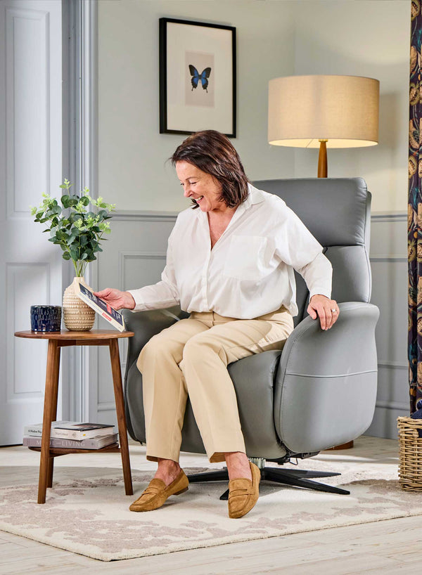Belmont Swivel Riser Recliner in use
