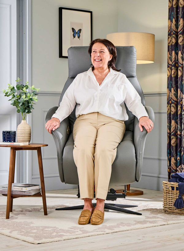 Belmont Swivel Riser Recliner in use