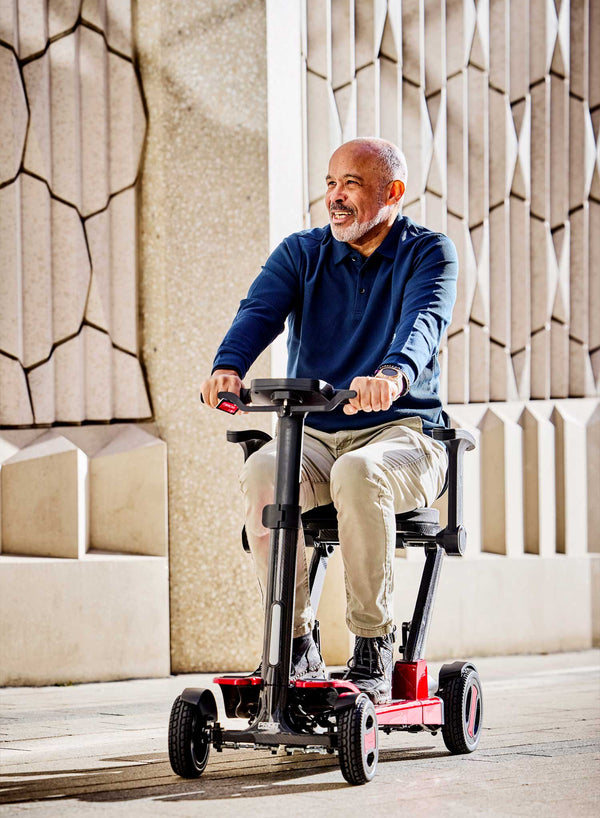 Pride GoGo Carbon Folding Scooter in use