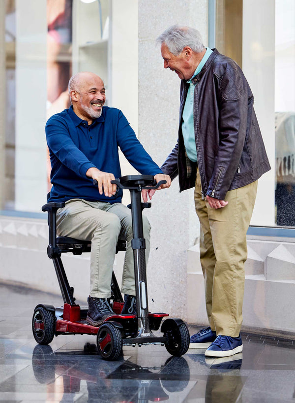 Pride GoGo Carbon Folding Scooter in use
