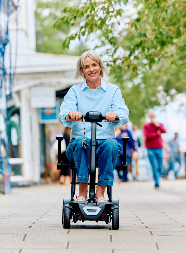 Li-Tech Cybex Electric Folding Scooter in use