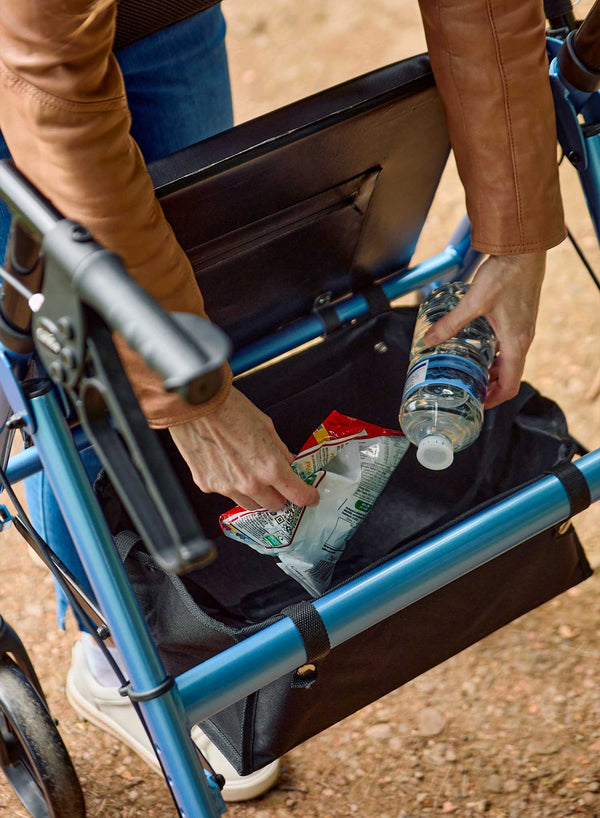 CareCo Oracle Rollator in use