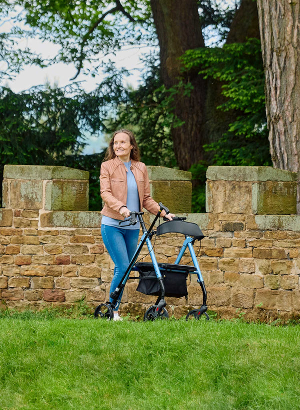 CareCo Oracle Rollator in use