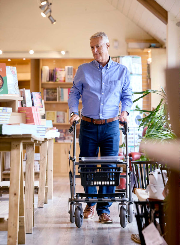 CareCo Metro Rollator in use