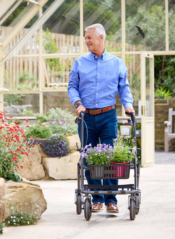 CareCo Metro Rollator in use