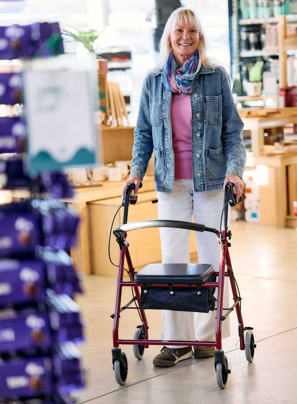 CareCo Spirit Rollator in use