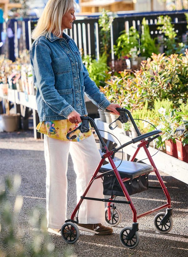 CareCo Spirit Rollator in use