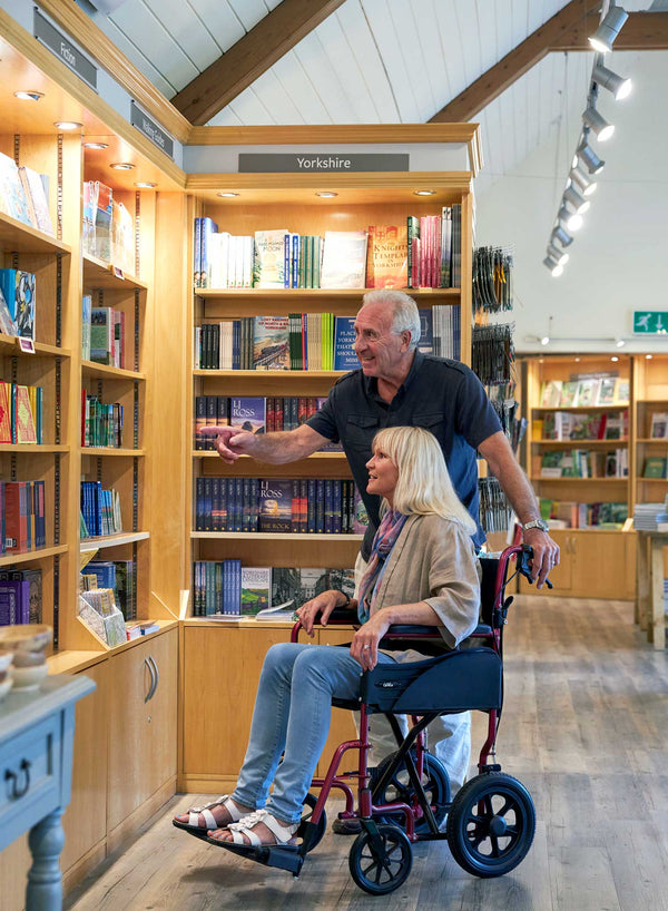 CareCo Infiniti Transit Wheelchair in use