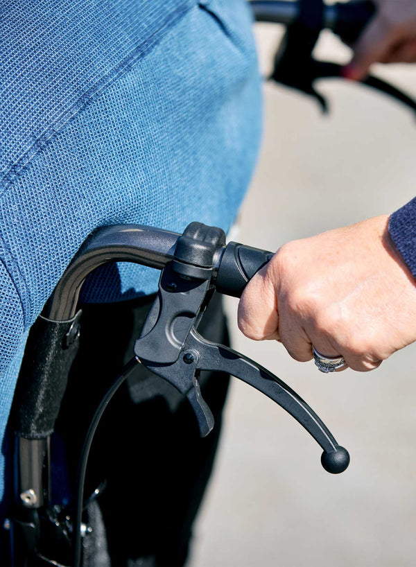 CareCo Travel Air Compact Wheelchair in use