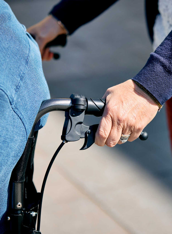 CareCo Travel Air Compact Wheelchair in use