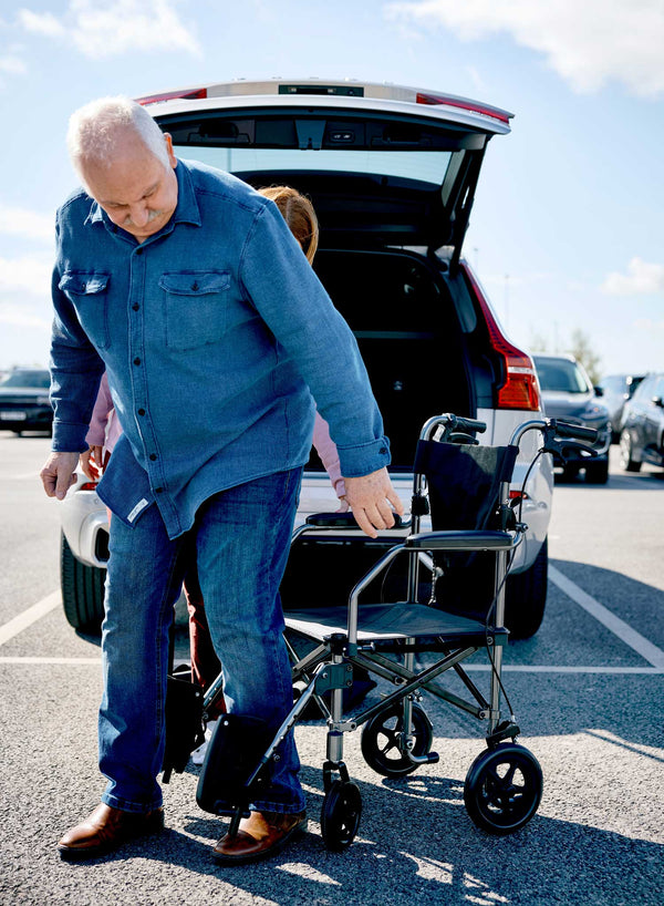 CareCo Travel Air Compact Wheelchair in use