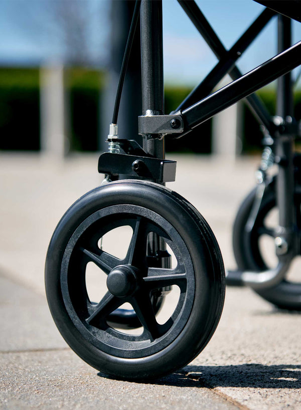 CareCo Travel Air Compact Wheelchair in use
